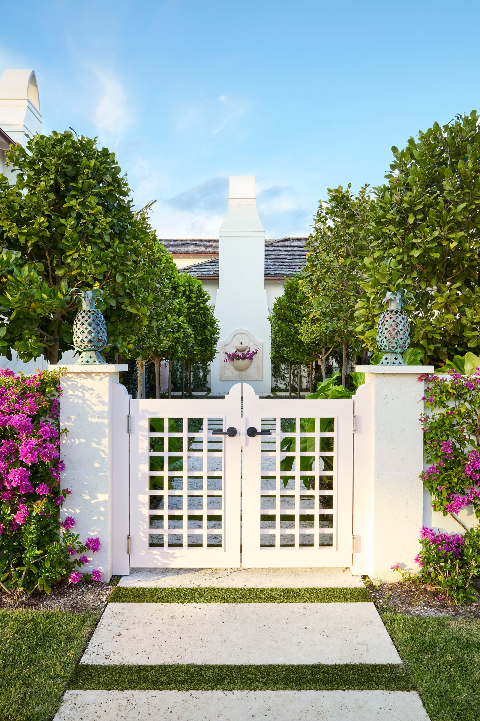 A lattice gate at the entrance to a Palm Beach house