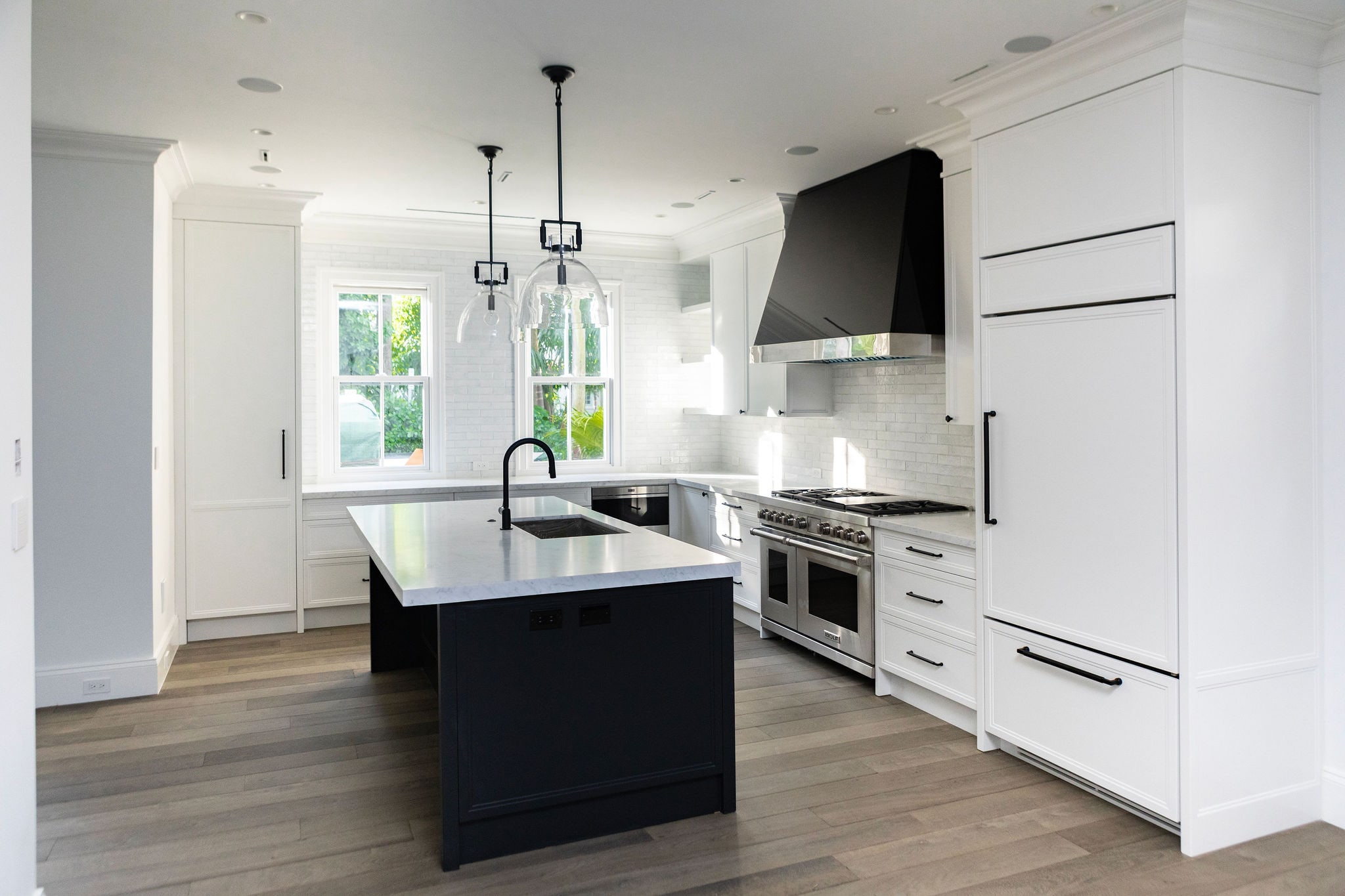 Kitchen with a dark island